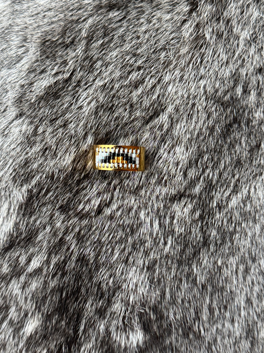 Adjustable beaded ring